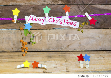 merry christmas message card handwriting  for special day in festival day and clips star wooden hang pink rope  59838755