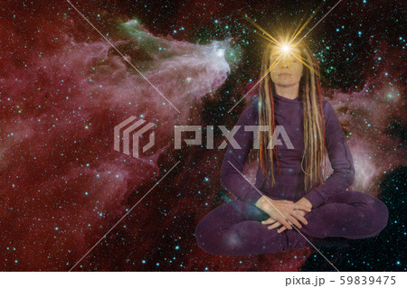 girl with soulful look against background of starry sky. on forehead of girl glowing star symbol of 59839475