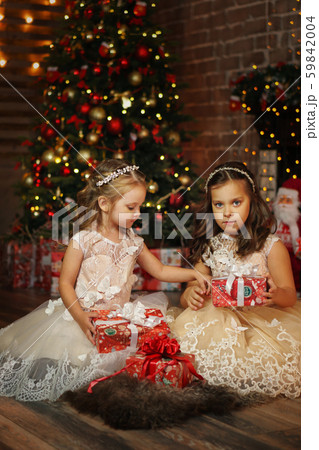 Little sisters on christmas eve Little sisters on christmas eve 59842004