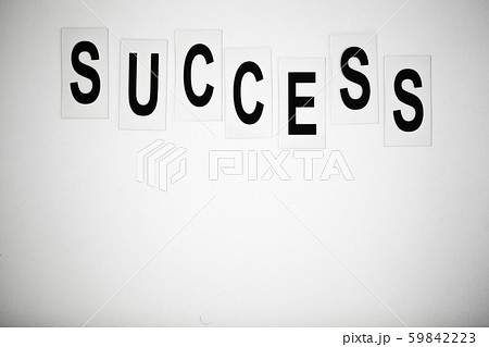 Success word written on white table. Copy space 59842223