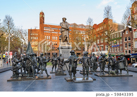 Monument to Rembrandt and sculptures of his picture "Night watch'' at Rembrandtplein in Amsterdam 59843395