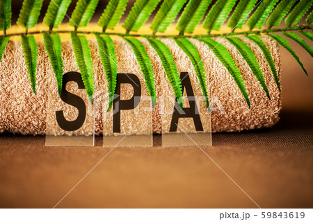 Chocolate Spa . Composition brown towel in hotel room of spa treatment 59843619