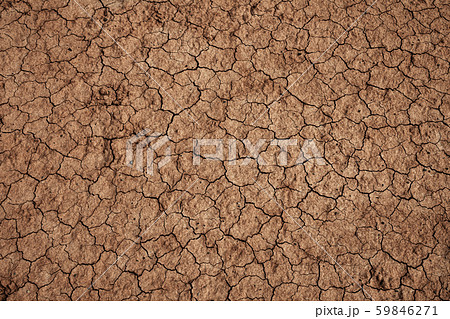 Dry cracked soil during drought Dry cracked soil during drought 59846271