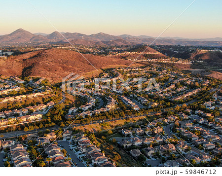 Aerial view of residential modern subdivision during sunset Aerial view of residential modern subdivision during sunset 59846712
