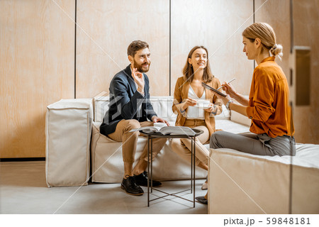 Couple at a reception at sales department or psychotherapist Couple at a reception at sales department or psychotherapist 59848181