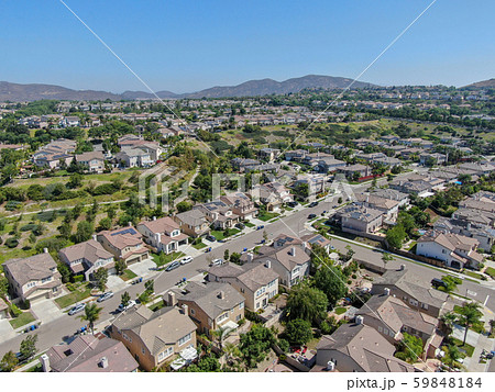 Aerial view suburban neighborhood with big villas Aerial view suburban neighborhood with big villas 59848184