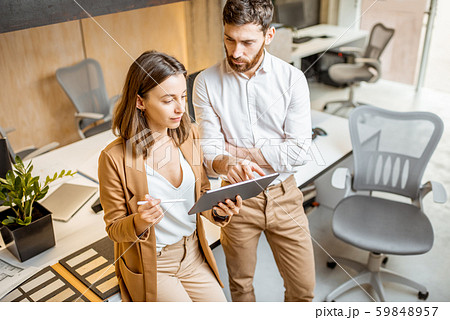 Collegues having a creative digital work in the office 59848957