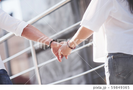 Beautiful happy couple hugging on the city street.Lifestyle concept love and romance 59849365