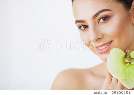 Skincare. Woman Beauty, Face Skin Care and Make Up, Girl Orchid Flower 59850508