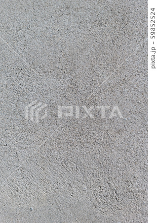 Gray textured cement wall background with fine concrete chips. Construction backgrounds Gray textured cement wall background with fine concrete chips. Construction backgrounds 59852524