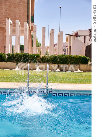 woman swimming in a pool 59854581