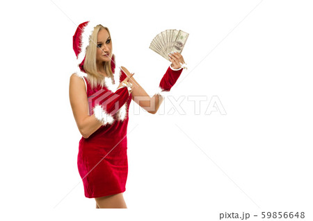 A beautiful sexy girl in a New Year's dress points 59856648