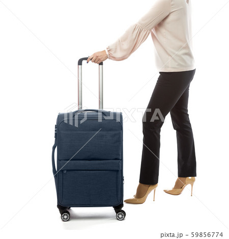 Back of businesswoman going in a travel and carry 59856774