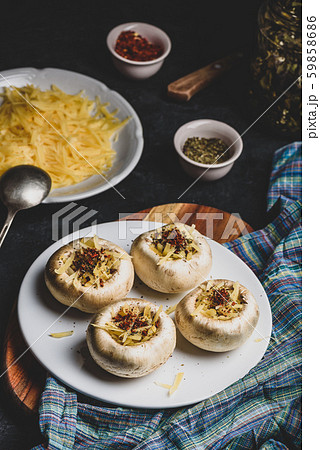 Button mushrooms stuffed with cheese and spices 59858686