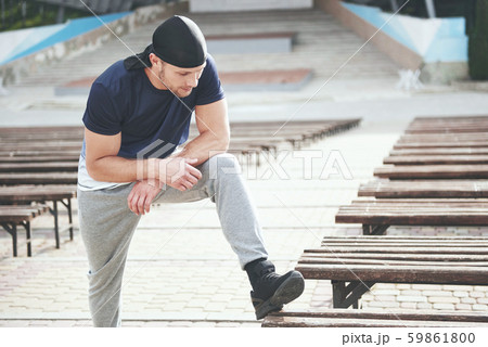 Young sports man doing parkour in the city. 59861800