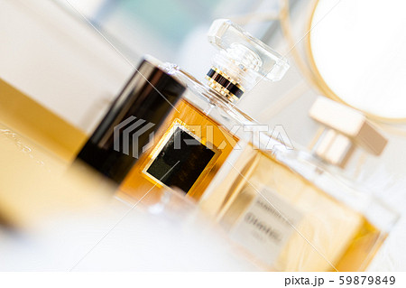 Two bottles of perfume with blank labels and luxurious beauty accessories Two bottles of perfume with blank labels and luxurious beauty accessories 59879849