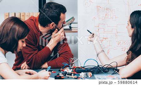 engineers teamwork electronic device project 59880614