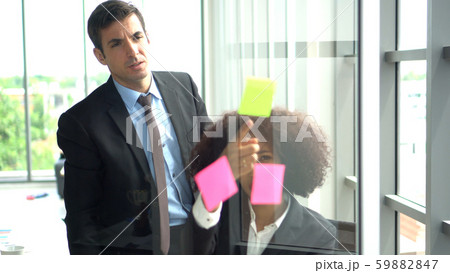 African and international professional colleague brainstrom marketing plan African and international professional colleague brainstrom marketing plan 59882847