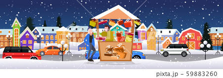 woman buying present box in gifts stall christmas market winter fair concept happy new year merry 59883260