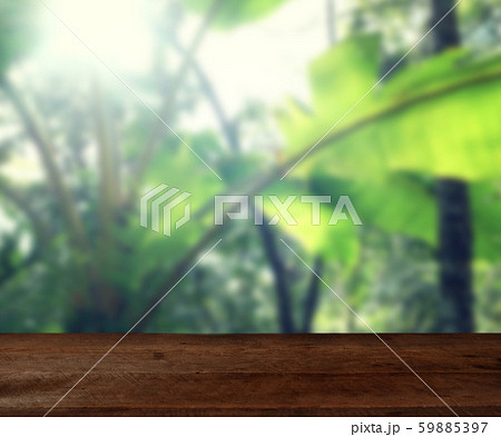 Empty wood table top on blur abstract green from Empty wood table top on blur abstract green from 59885397