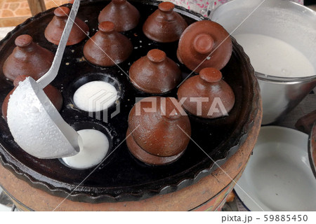 kind of Thai sweetmeat . Coconut milk mix with 59885450