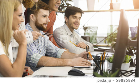 System administrator upgrading software system for office computers 59885934
