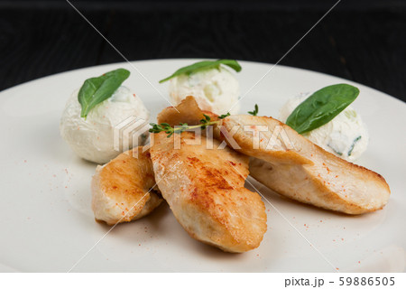 Grilled chicken breast with mozzarella cheese. Grilled chicken breast with mozzarella cheese. 59886505