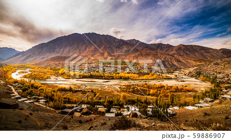 Aerial view of Snow Mountain and light of sunrise on the top himalaya mountains from the plane 59886907