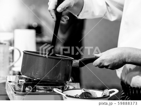 chef cooking in a kitchen, chef at work, Black & 59888373