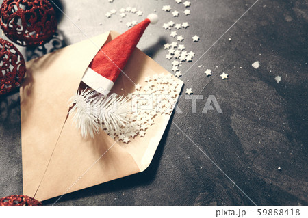 Christmas composition with sweets, fir branch and Santa hat. greeting card Christmas composition with sweets, fir branch and Santa hat. greeting card 59888418
