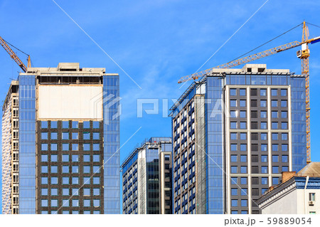 The glass facade, a reflection of the blue sky 59889054