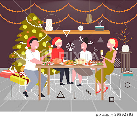 friends sitting at table having christmas dinner merry xmas happy new year winter holidays 59892392