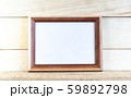 Horizontal wooden mockup frames on a light 59892798