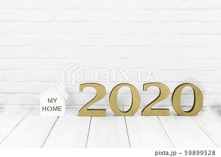 2020 new year and home on white wood table over 2020 new year and home on white wood table over 59899528