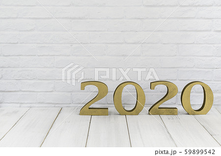 2020 new year on white wood table over white 59899542