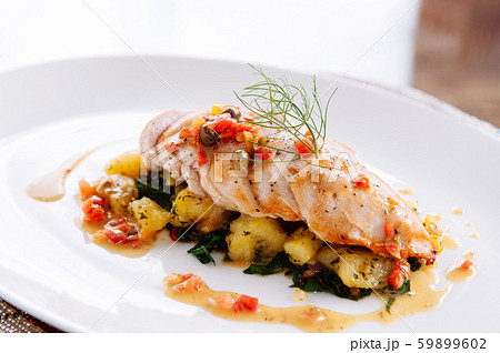 Grill chicken breast with baked potato and kale Grill chicken breast with baked potato and kale 59899602