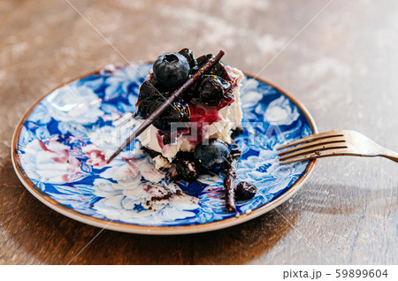 Blueberry Cheese pie already eaten on oriental style beautiful dish Blueberry Cheese pie already eaten on oriental style beautiful dish 59899604