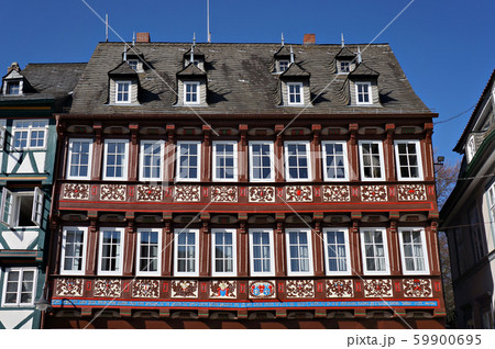 Decorated facade of medieval house in Goslar, 59900695