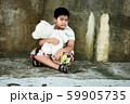 Asian boy sitting alone ,vintage tone 59905735