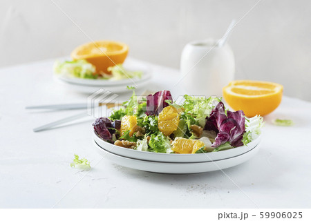 Salad with oranges and walnut Salad with oranges and walnut 59906025