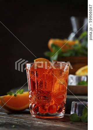 Traditional italian cocktail with wine and orange Traditional italian cocktail with wine and orange 59906087