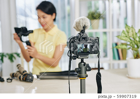 Blogger reviewing video production equipment 59907319