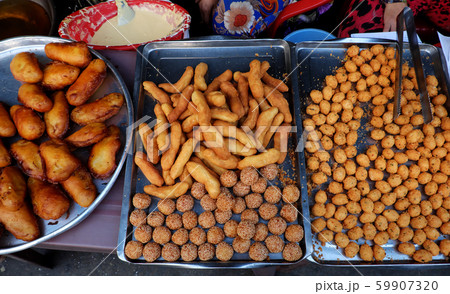 tray crispy snacks cake from powder deep fried at Ho Chi Minh city outdoor food street tray crispy snacks cake from powder deep fried at Ho Chi Minh city outdoor food street 59907320