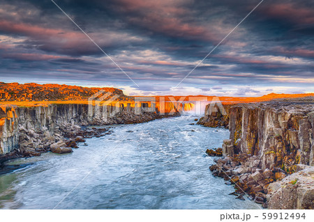 Dramatic sunset view of fantastic waterfall and Dramatic sunset view of fantastic waterfall and 59912494