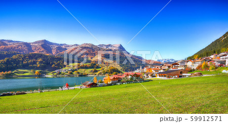 Bright autumn view of San Valentino village and Bright autumn view of San Valentino village and 59912571