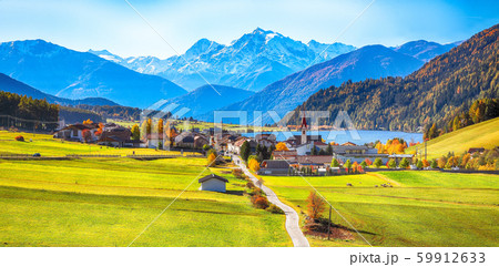 Magnificent autumn view of St.Valentin village and 59912633