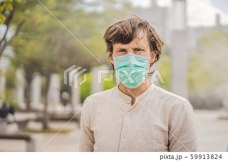 men wearing facial hygienic mask for Safety outdoor. People in masks because of fine dust. Problems 59913824