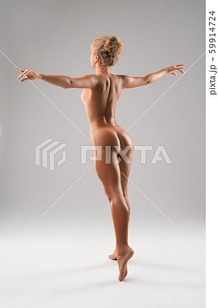 Nude beautiful woman jumping rearview Nude beautiful woman jumping rearview 59914724