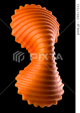 Macro photo of orange farfalle pasta isolated on black with clipping path 59917531