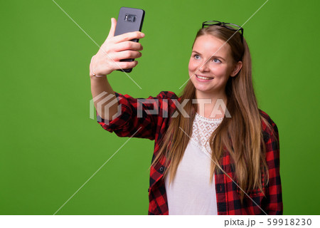 Young beautiful hipster woman with blond hair 59918230